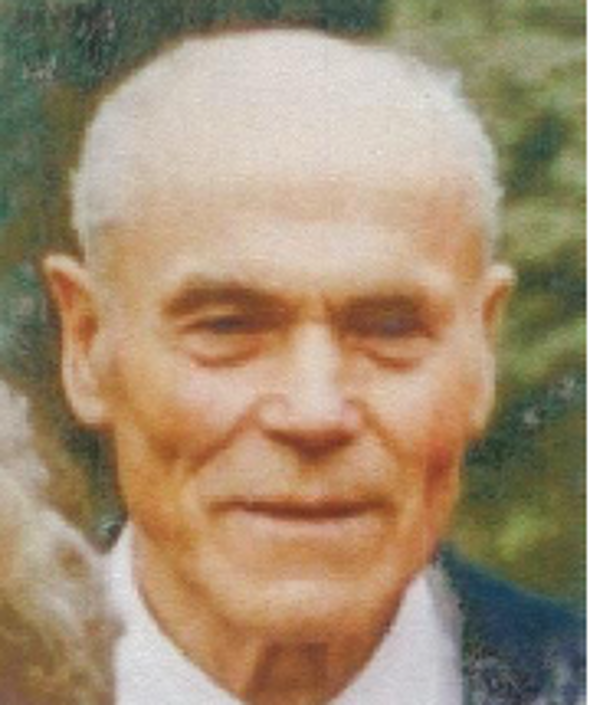 Porträt von Franz Thelen, lächelnd vor neutralem Hintergrund